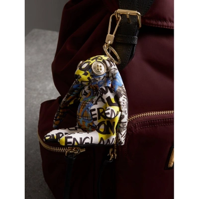 Shop Burberry Vera The Hare Graffiti Print Cotton Charm In Yellow