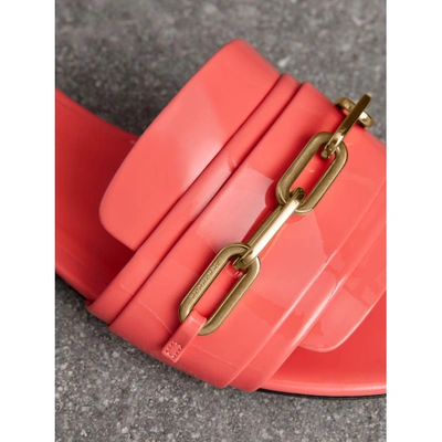 Shop Burberry Link Detail Patent Leather Slides In Pink Azalea