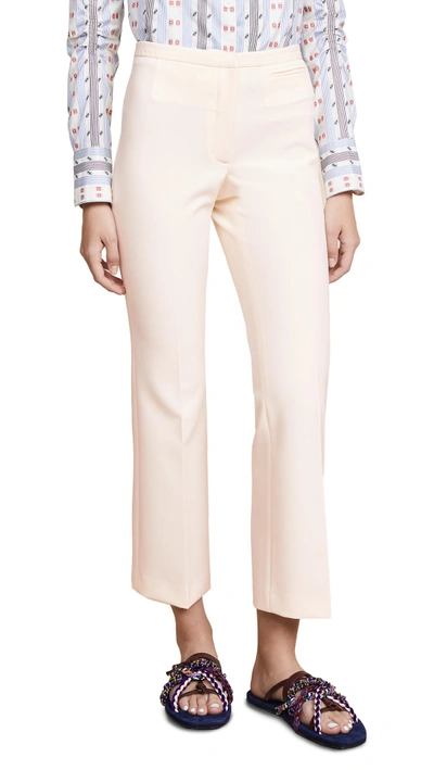Shop Carven Cropped Stretch Crepe Flared Trousers In Vanille