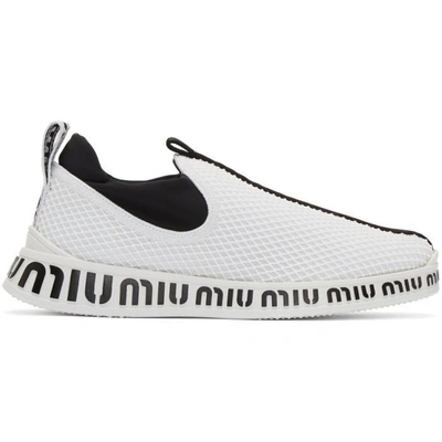 Shop Miu Miu White And Black Embossed Slip-on Sneakers In F0009 Bianc