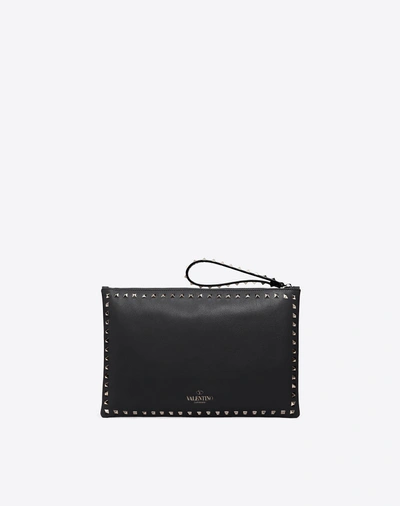 Shop Valentino Rockstud Clutch In Black