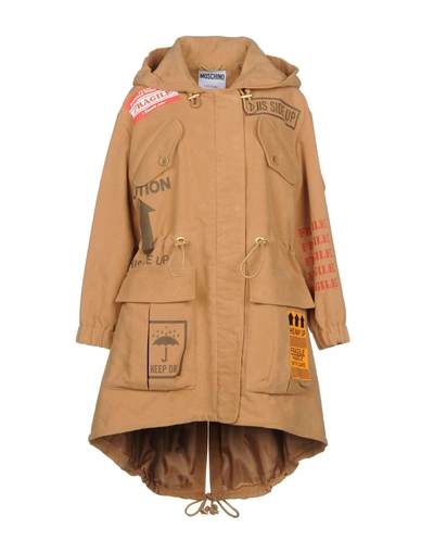 Shop Moschino Coats In Camel