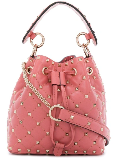 Shop Valentino Garavani Rockstud Quilted Mini Bucket Bag - Pink