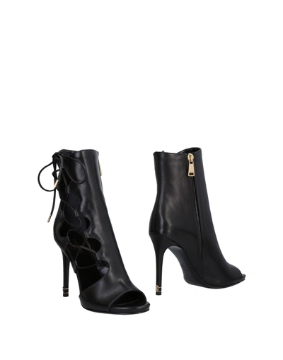 Shop Roberto Cavalli Ankle Boot In Black