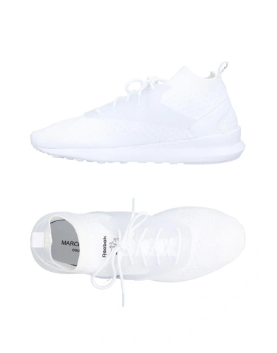 Shop Reebok Sneakers In White