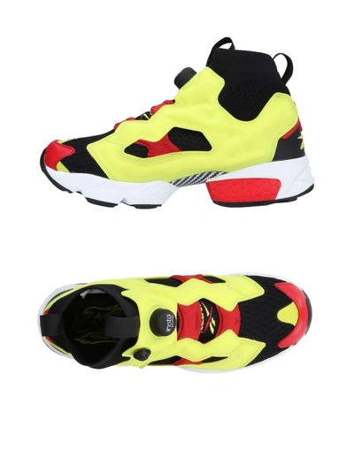 Shop Reebok Trainers In Yellow