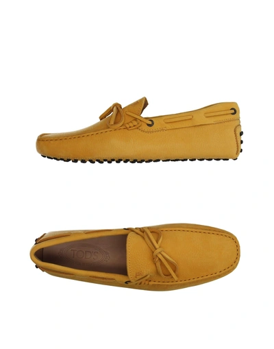 Shop Tod's Man Loafers Yellow Size 7 Leather