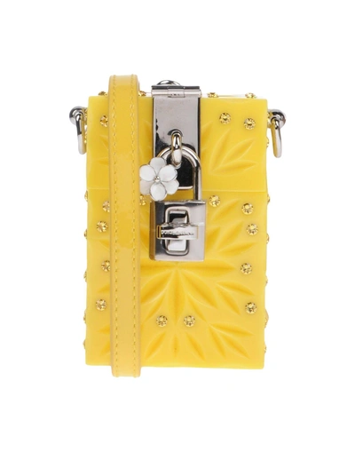 Shop Dolce & Gabbana Handbags In Yellow