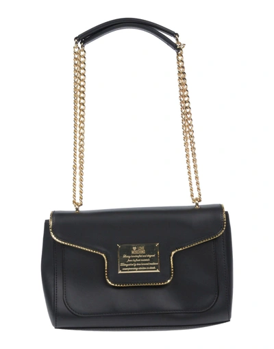 Shop Love Moschino Handbags In Black