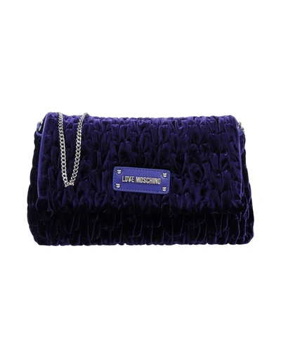 Shop Love Moschino Handbags In Purple