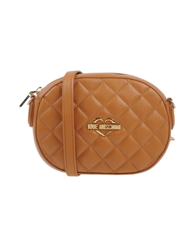 Shop Love Moschino Handbags In Tan