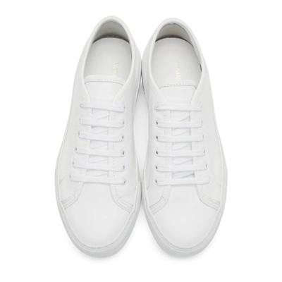 Shop Common Projects Woman By  White Tournament Low Super Sneakers In 0506 White