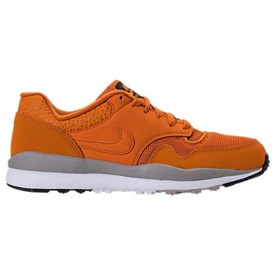 Shop Nike Men's Air Safari Casual Shoes, Orange