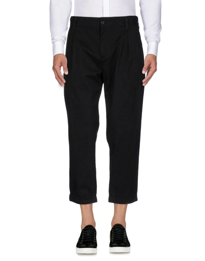 Shop Carhartt Casual Pants In Black
