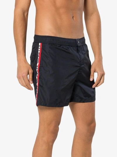 Shop Moncler Logo Stripe Embroidered Swim Shorts In Blue