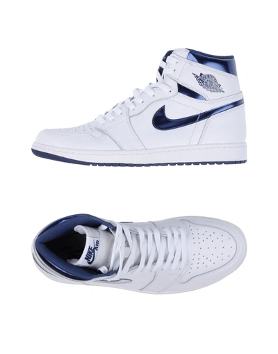 Shop Nike Sneakers In White