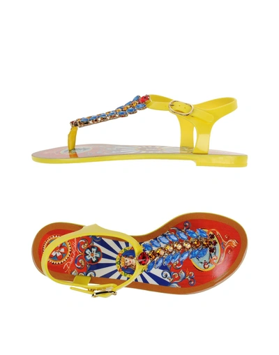 Shop Dolce & Gabbana Flip Flops In Yellow