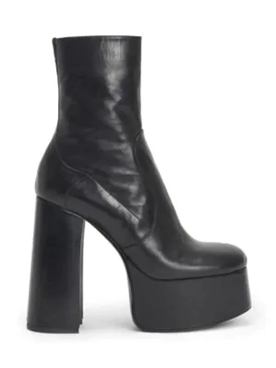 Shop Saint Laurent Billy Platform Leather Boots In Black