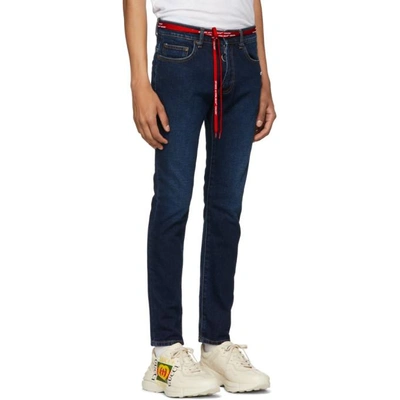 Shop Off-white Blue Skinny Feat Bleach Jeans In 7100 Bleach