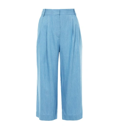 Shop Tibi Light Denim Chambray Cropped Pleat Pants