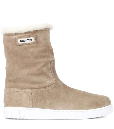 Shop Miu Miu Suede And Shearling Ankle Boots In Beige