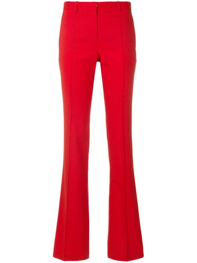 Shop Versace Flat Front Flared Bottom Trousers