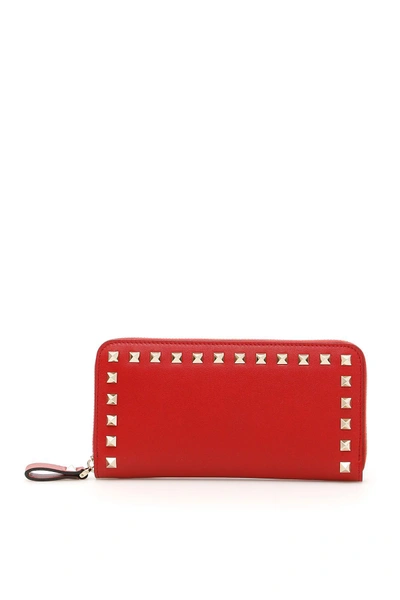 Shop Valentino Rockstud Zip-around Wallet In Rosso