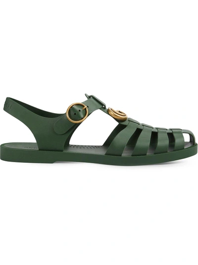 Shop Gucci Rubber Buckle Strap Sandal In Green