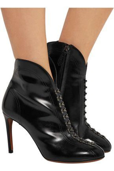 Shop Alaïa Woman Embellished Glossed-leather Ankle Boots Black