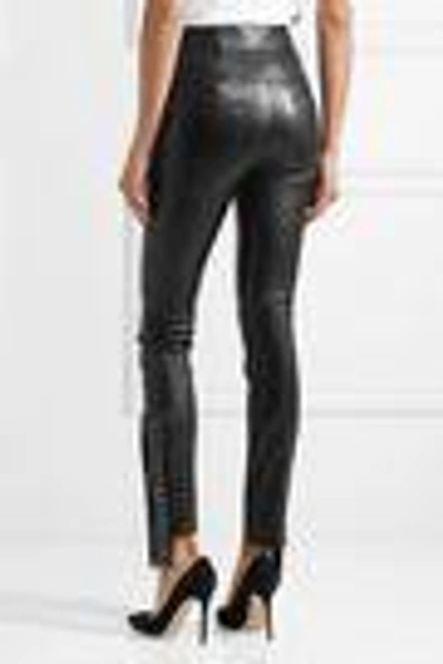 Shop Saint Laurent Eyelet-embellished Leather Skinny Pants In Black