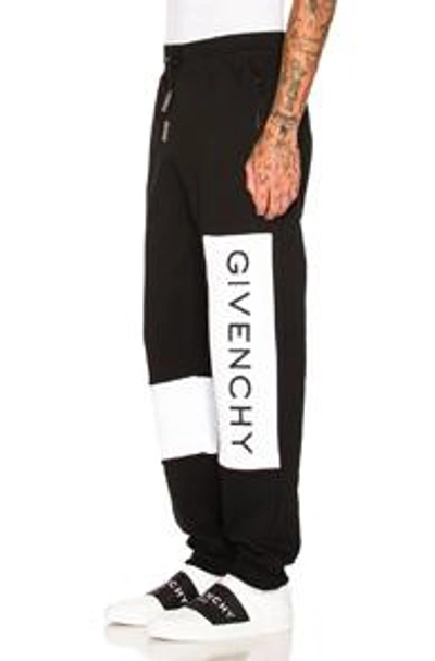 Shop Givenchy Logo Sweatpants In Black