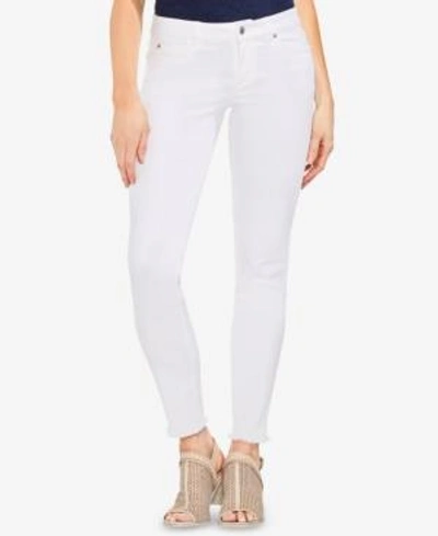 Shop Vince Camuto Frayed-hem Skinny Jeans In Ultra White