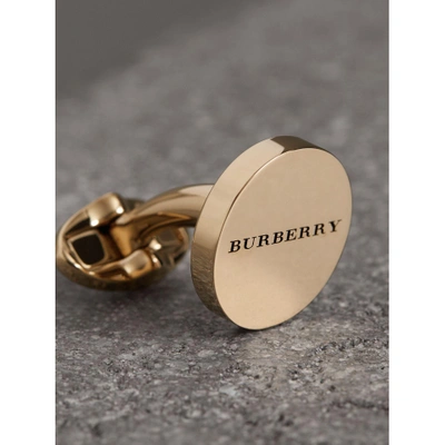 Shop Burberry Engraved Bronze Cufflinks In Light Gold