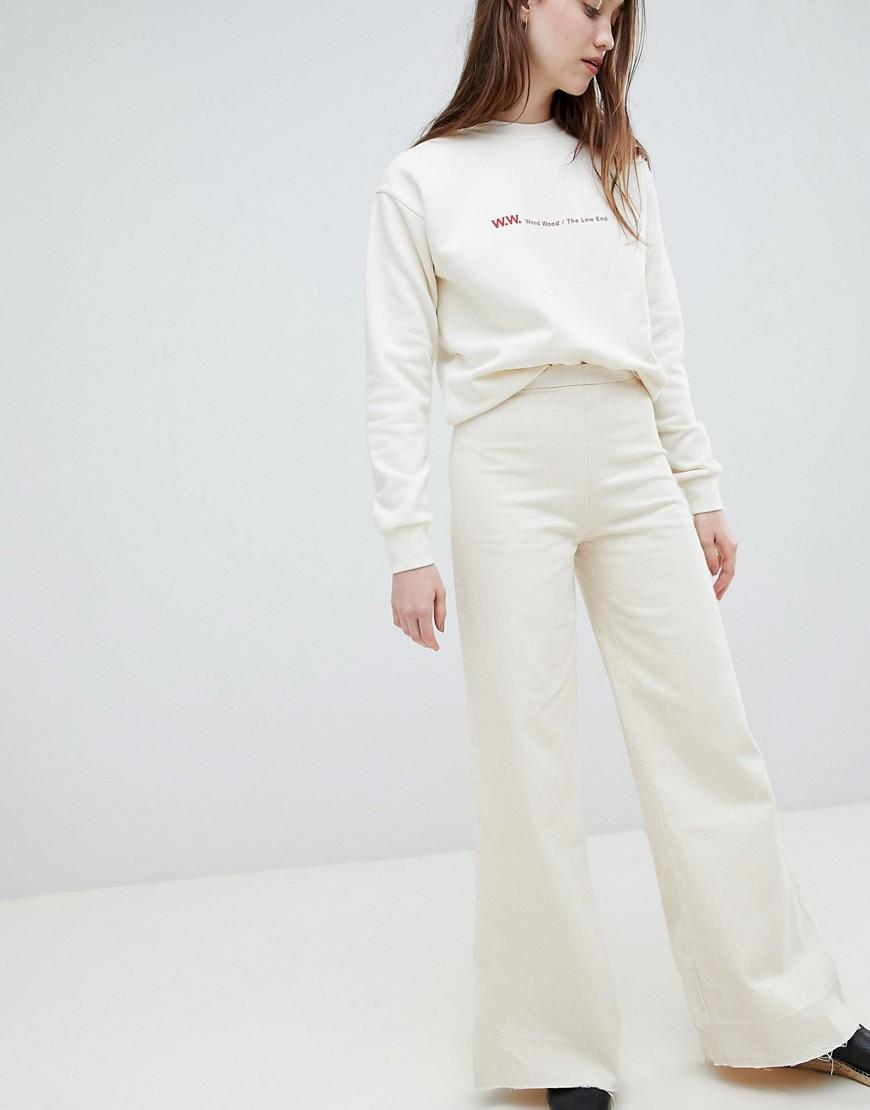 cream wide leg jeans