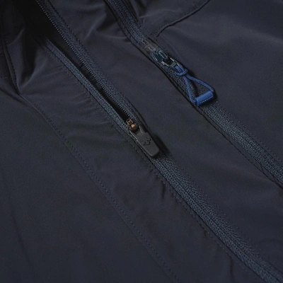 Shop Descente Allterrain Stretch Packable Jacket In Blue