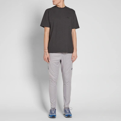 Shop Nike Tribute Track Pant In Grey