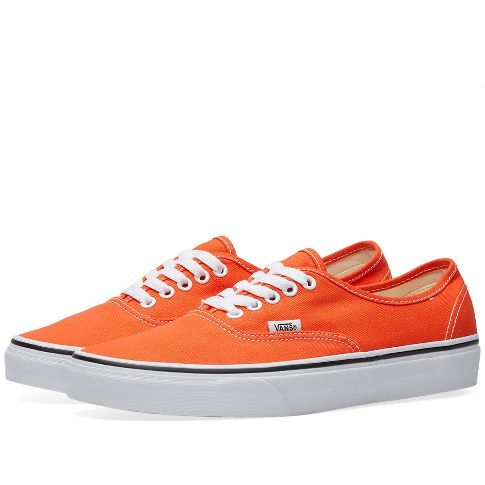 orange vans on feet