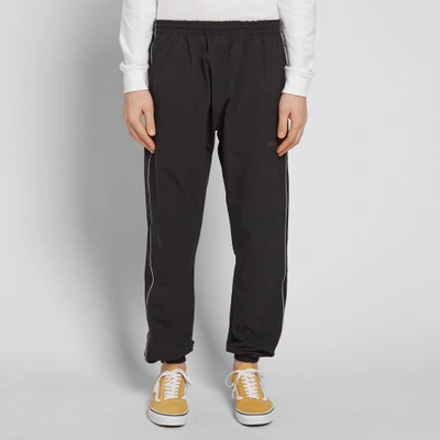 Shop Raised By Wolves Schoeller Tech Track Pant In Black
