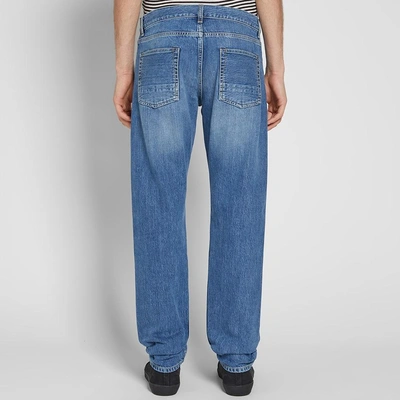 Shop Alexander Mcqueen Distressed Slim Fit Jeans In Blue