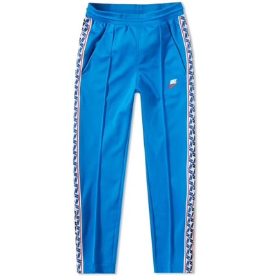 Nike Taped Poly Pant In Blue | ModeSens