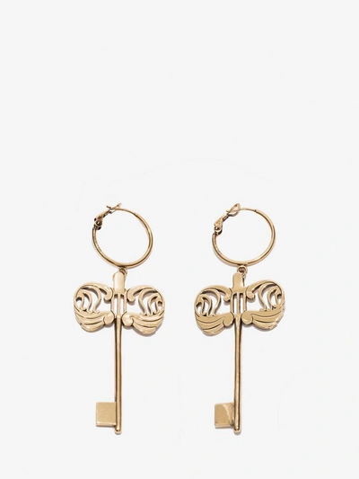 Shop Alexander Mcqueen Key Charm Earrings In Gold