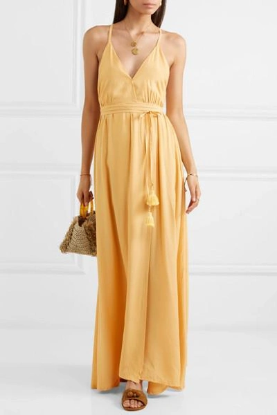 Shop Faithfull The Brand Santa Rose Tasseled Wrap-effect Voile Maxi Dress In Pastel Yellow