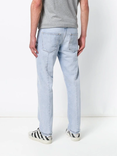 Shop Off-white Distressed Firetape Jeans