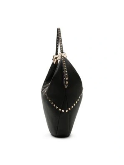 Shop Valentino Small Rockstud Leather Hobo Bag In Black