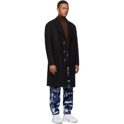 Shop Valentino Blue Camouflage Cargo Trousers In Pkp Blue