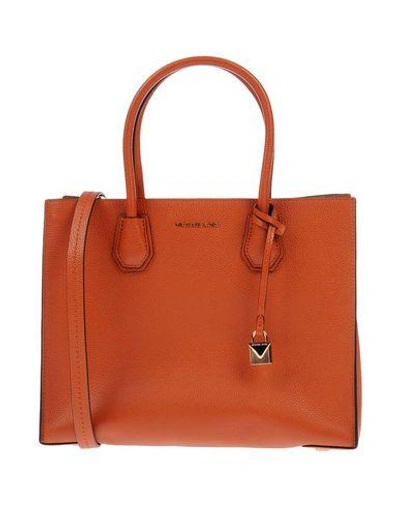 Shop Michael Michael Kors Handbags In Orange