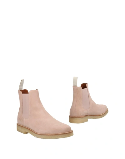 Shop Common Projects Ankle Boots In Pink