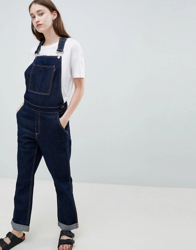Shop Waven Thea Rinse Indigo Denim Overall's With Wolf Embroidery - Blue