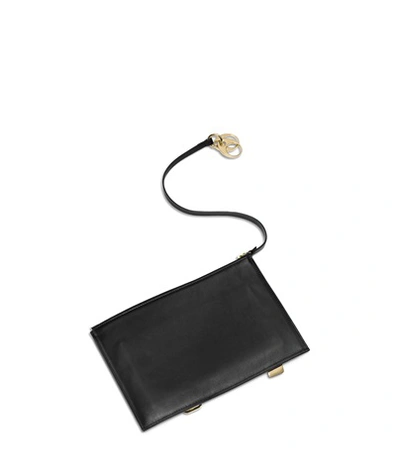 Shop Stuart Weitzman The Cosmos Zip Pouch In Black Leather