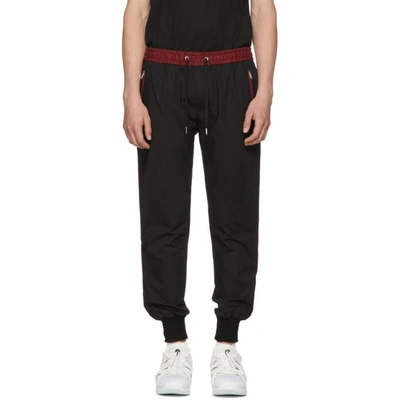 Shop Dolce & Gabbana Dolce And Gabbana Black And Red Stripe Cuff Trousers In N0000 Blk